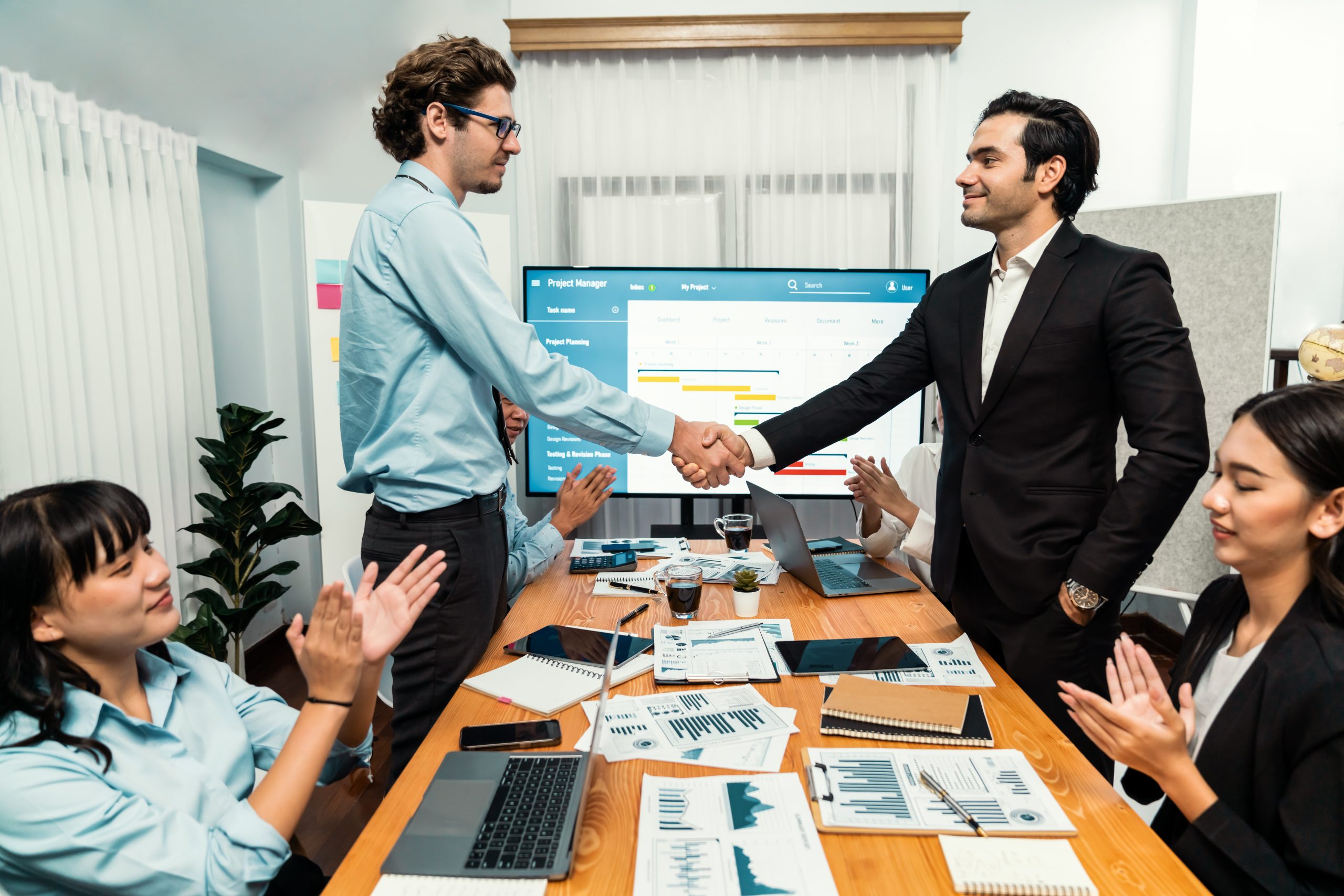 Cheerful meeting room, businesspeople celebrate with handshaking. Successful project was completed before the deadline. Business partnership and collaboration in project management. Habiliment SSUCv3H4sIAAAAAAAACnRTsY7cIBDtI+UfVq4PxRgw9pVXpIuU/pQChmEXnRdWxr4oOt2/Z2yvvRRJ5/fm8XjMjD++fjmdKmtygOr59LEgwmEY5jyNZgopEl0/3fkRo8OxZN5H0dYlYUKJ0IUpjcEMJWnNBJdorkhknIdhoT/XYpUnM80Z85LlToGZ8EweG3lYbIFfN3zaC2uRTlCpeplziJjzt+8hmghYPRWaPNtF8xPTbcBqL2xX/sfvrv2Hy4+QAYfBRExzfphtH7+Ozpwxwp/1ZcWLRxzQbC9+PZrWKtdpxZSUPZNKSNbVqmNtr4Fjw9tWmj1GBUqgdhaZcAAkbhyzGhSzTnrbgFNWikPcdEYpzy2zXhsmQQPrdW0Zlw158q7phT/EvUNvnACGTcdJLFrWSSmYIei9k1bzh3Mtua1b7pmkIpNWaWYNSFbXlKJ3Thv7yNwJiZz3kindKCa9E8wKgQRFyxuNfY9+bePWu+rt94TjtVwKM7uQin14T2CGRSCK1t7GACGei2Npuqzrux+DNMdpXGZSHeGGlG7G0qCfT548cecvJmeSu50vLgL6WdK1uCemaZ3o3bVytMML5EII3rR9L3ituOCa3wXb3l8C+axxdiPC8BZc+fSwJKgAXOck1jRnR2OXXUf95sDaRgtthG2VF9TCz78AAAD//wMATqbuYeADAAA=