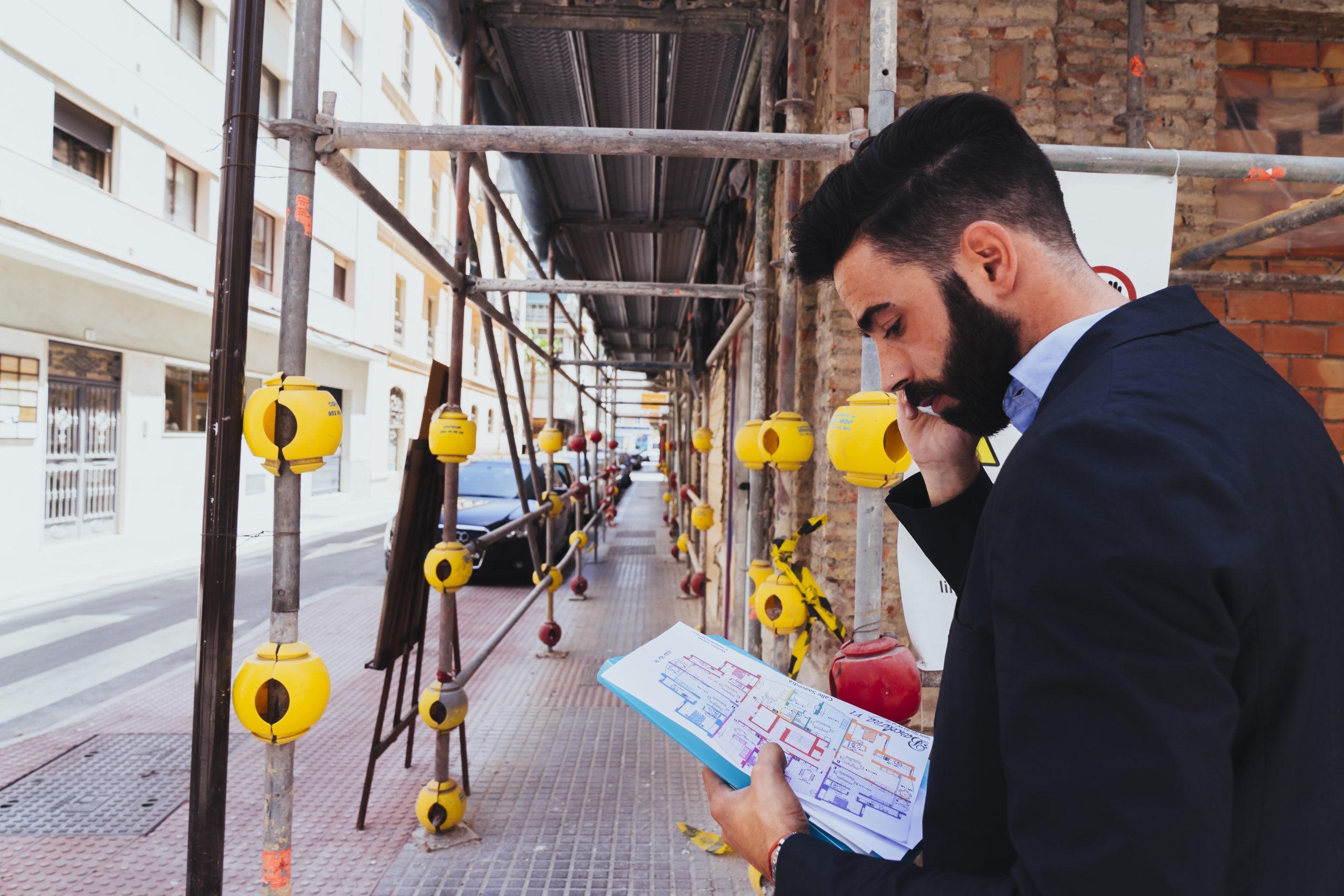 young-businessman-working-talking-phone